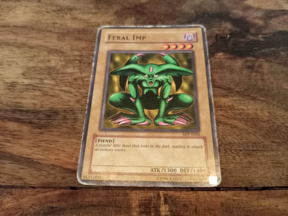 feral imp yugioh card A Little Fiend with Big Ears Featuring three different printings of Yu-Gi-Oh! | Bandai Card No.68